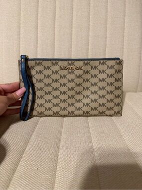 Michael Kors Tan Signature Wristlet with Blue Trim